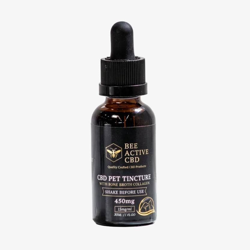 CBD pet tincture bottle with dropper on a white background
